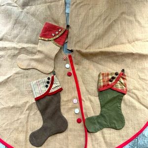 Tree skirt and 3 stockings.